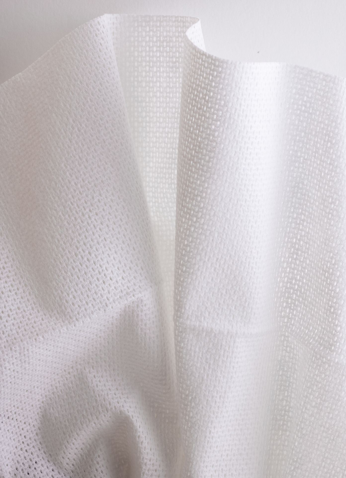 Genombruten draperad torkduk.