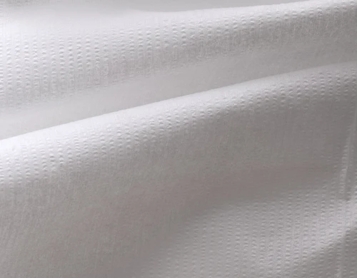 Kräppad draperad torkduk.