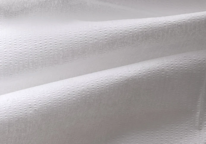 Kräppad draperad torkduk.